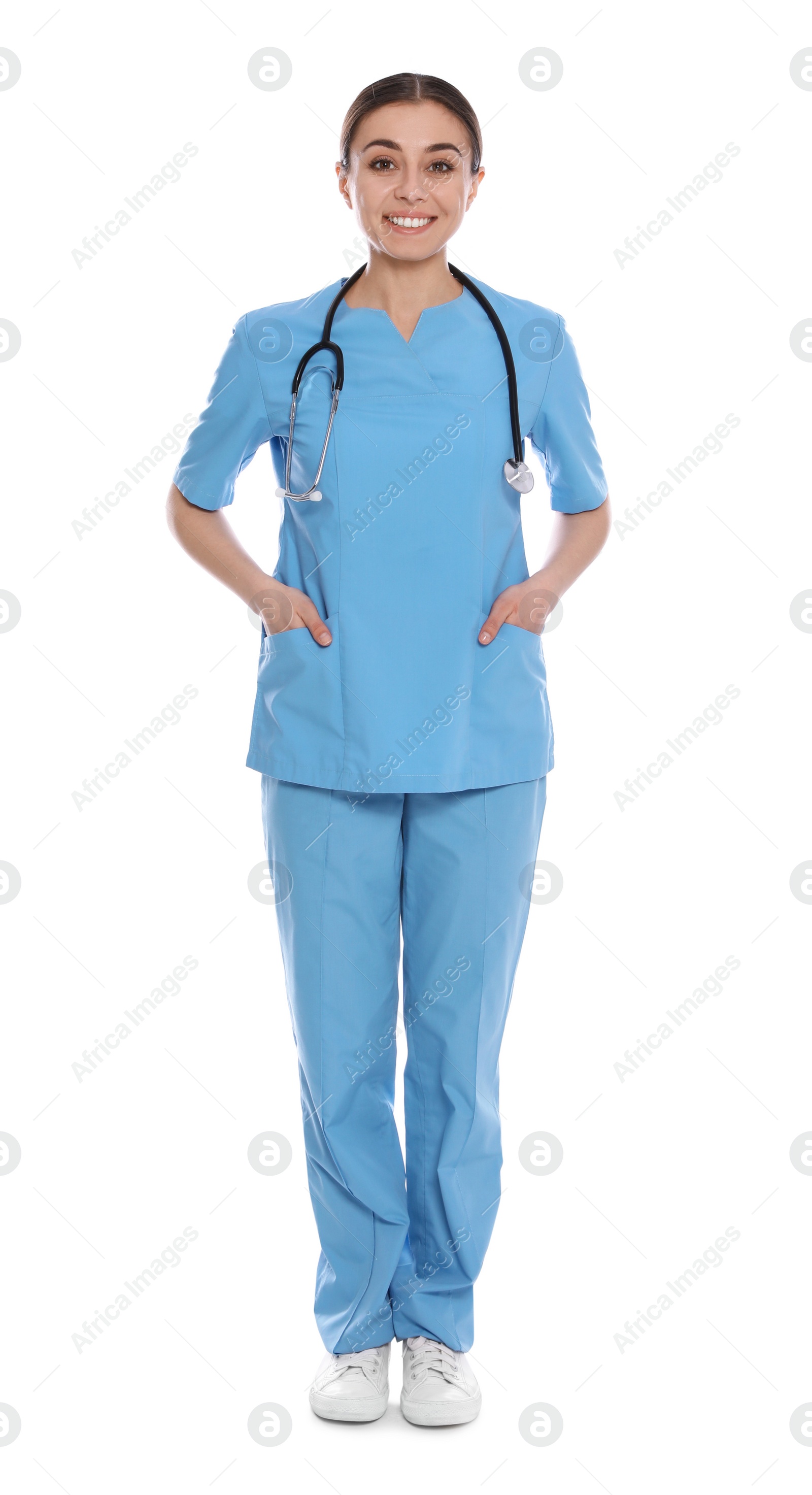 Photo of Full length portrait of medical doctor with stethoscope isolated on white