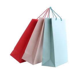 Different paper shopping bags isolated on white