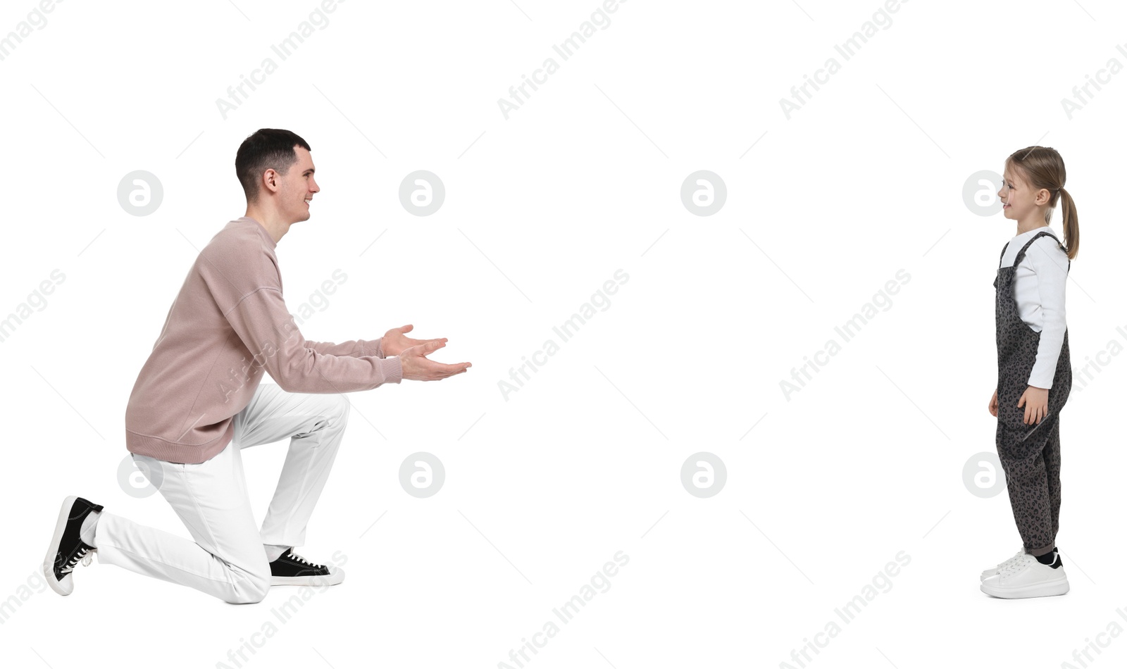 Image of Father reaching for his daughter on white background