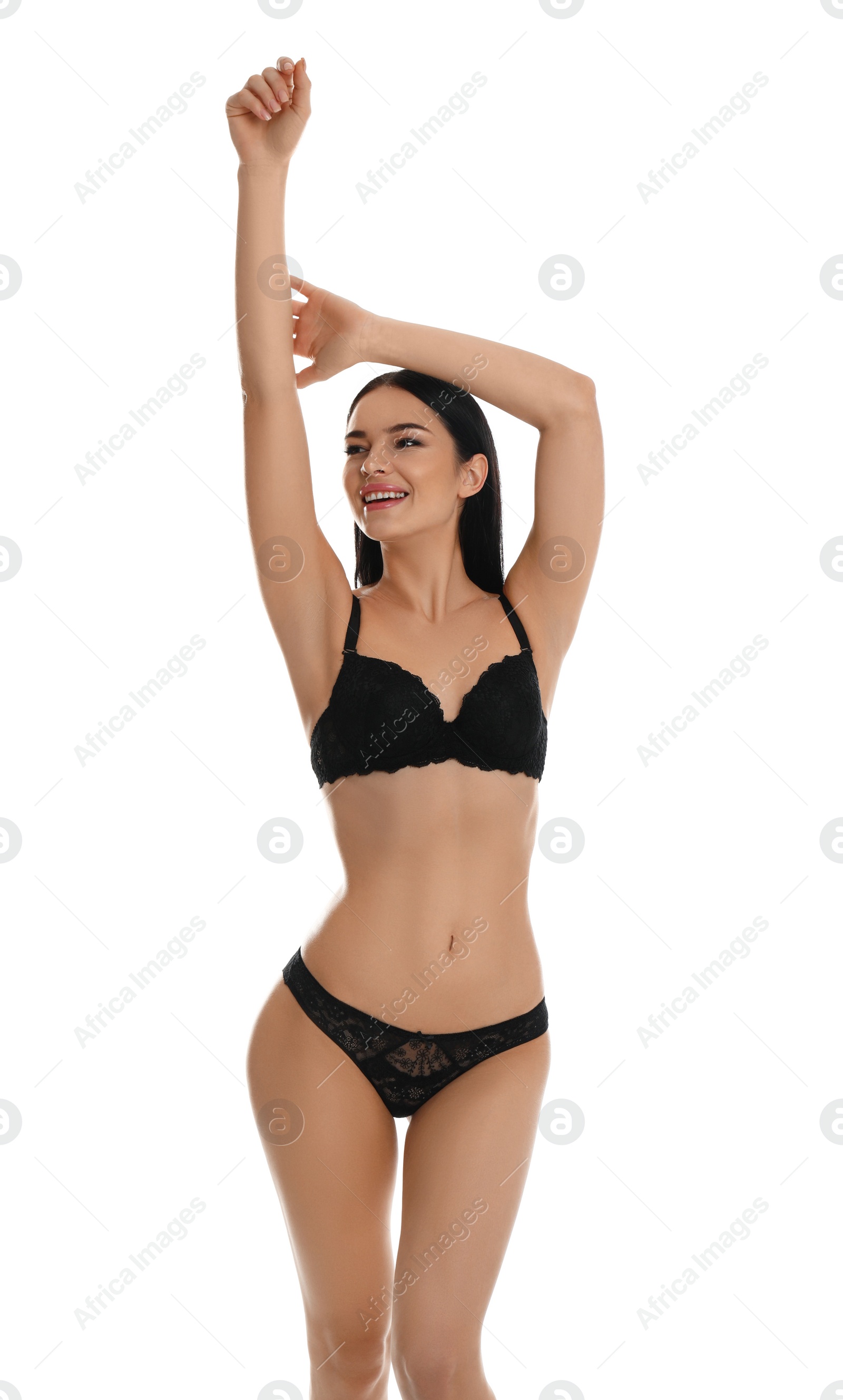 Photo of Beautiful young woman in black underwear isolated on white