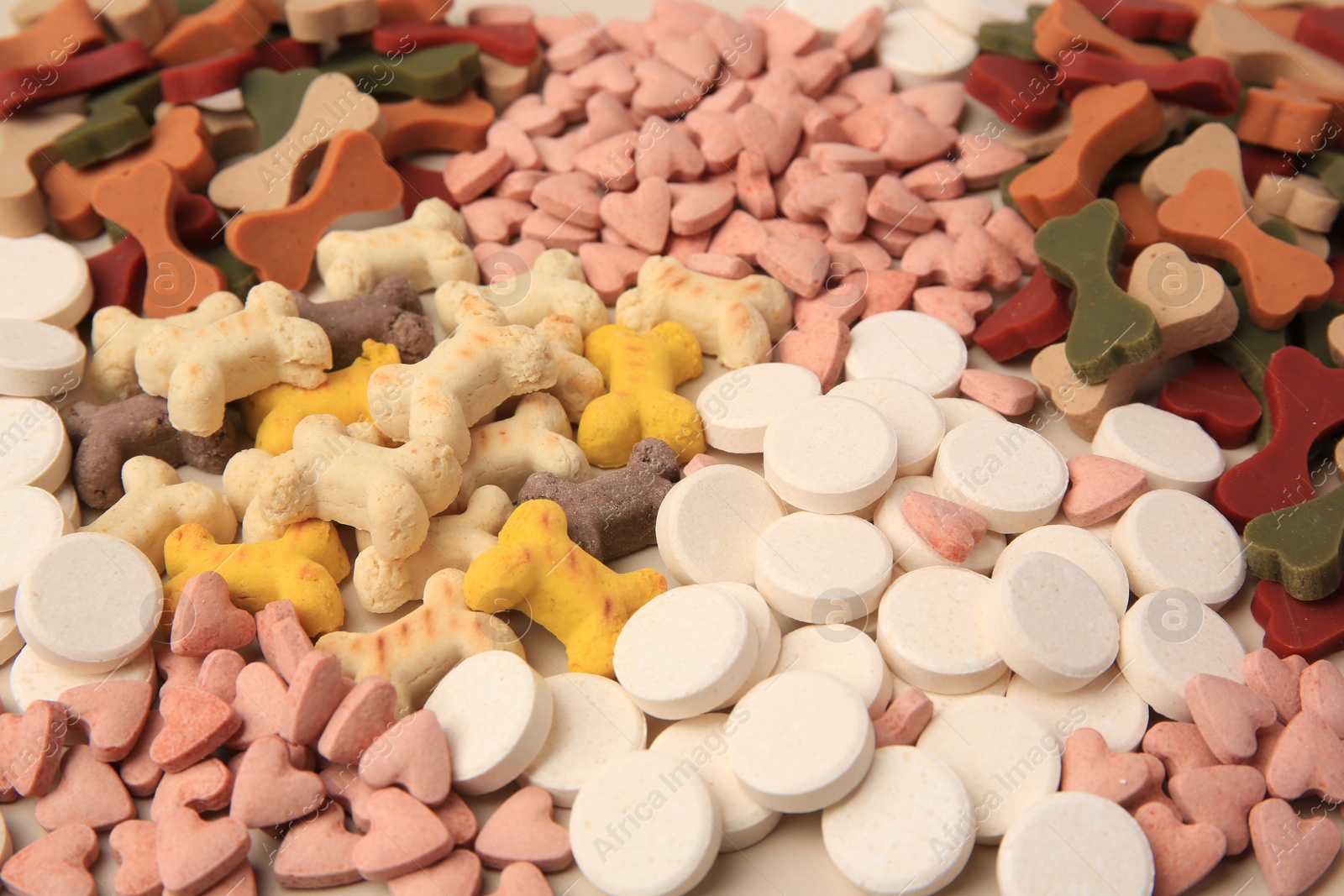 Photo of Many different vitamins for pets as background, closeup