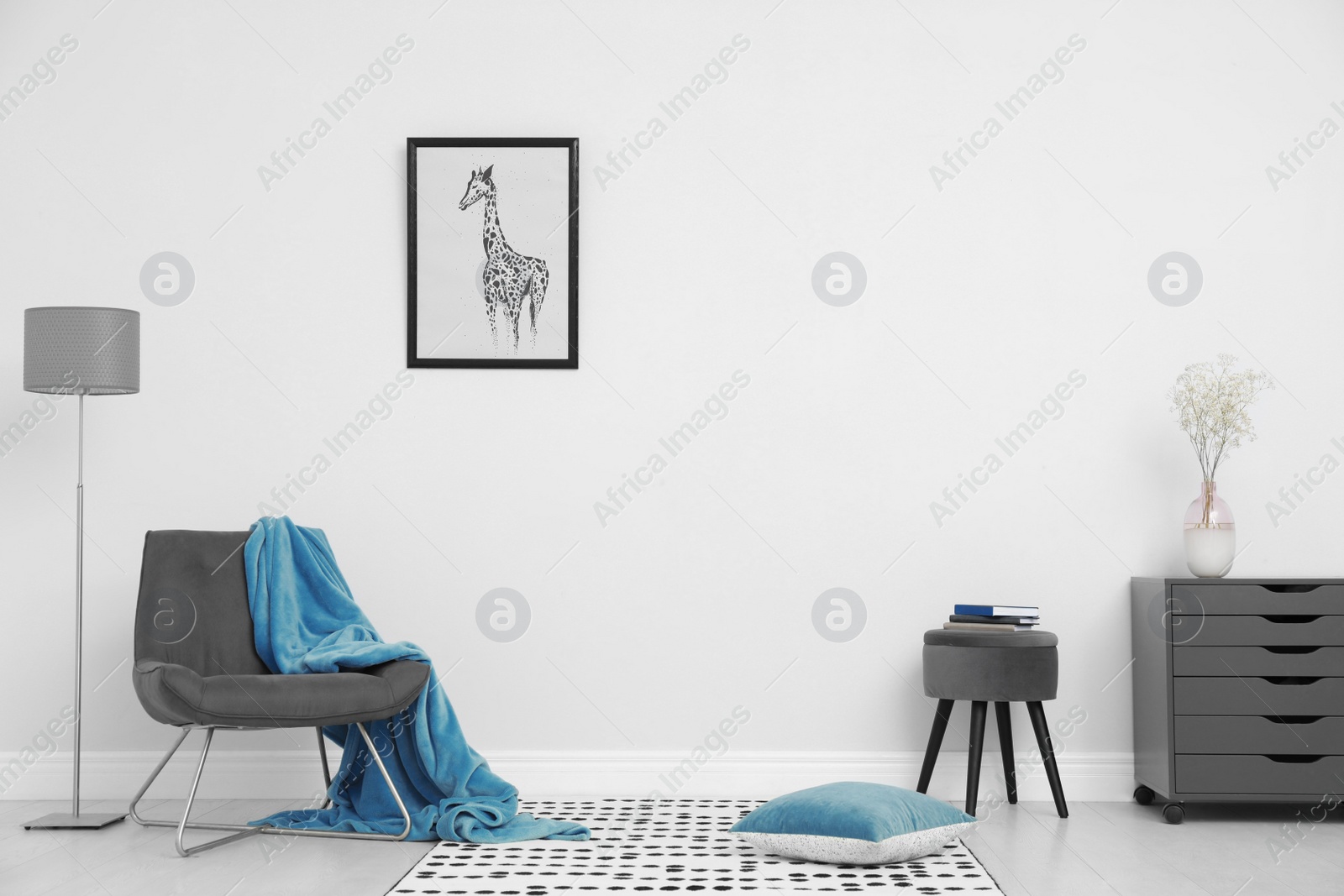 Photo of Room interior with stylish furniture near white wall