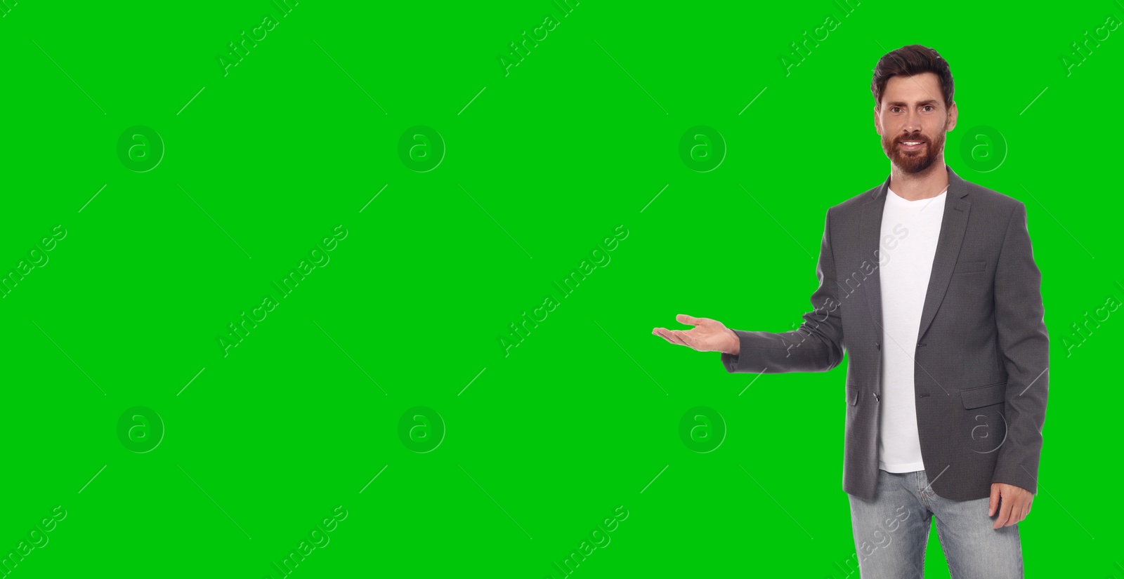 Image of Chroma key compositing. Broadcaster against green screen, banner design