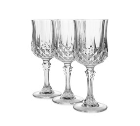 Photo of Elegant clean empty wine glasses isolated on white