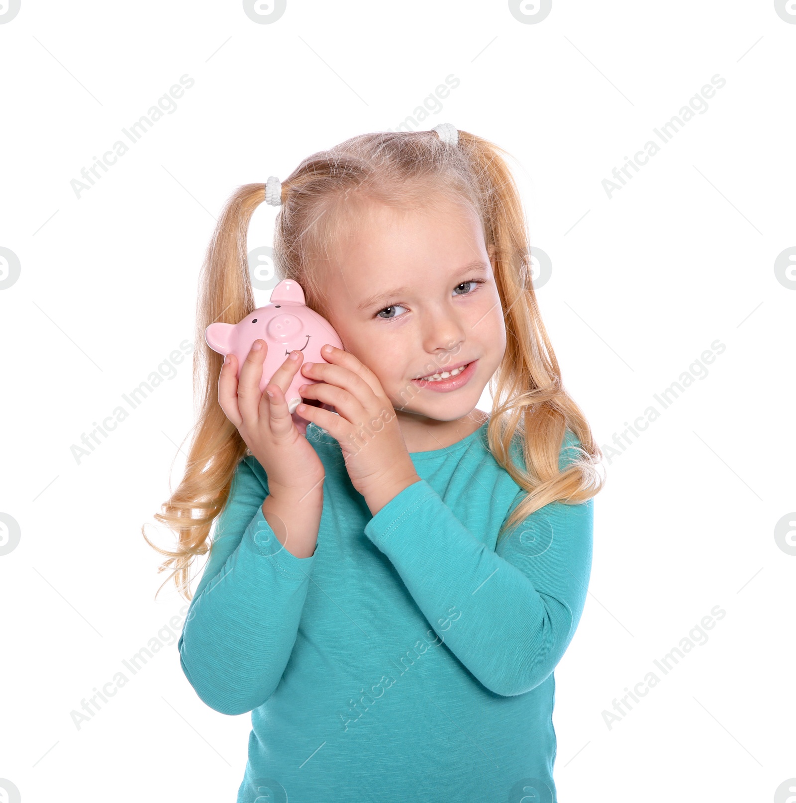 Photo of Little girl with piggy bank on white background