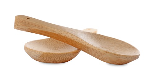 Photo of Two new wooden spoons on white background