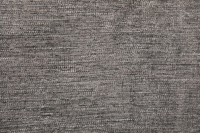 Soft warm grey plaid as background, closeup