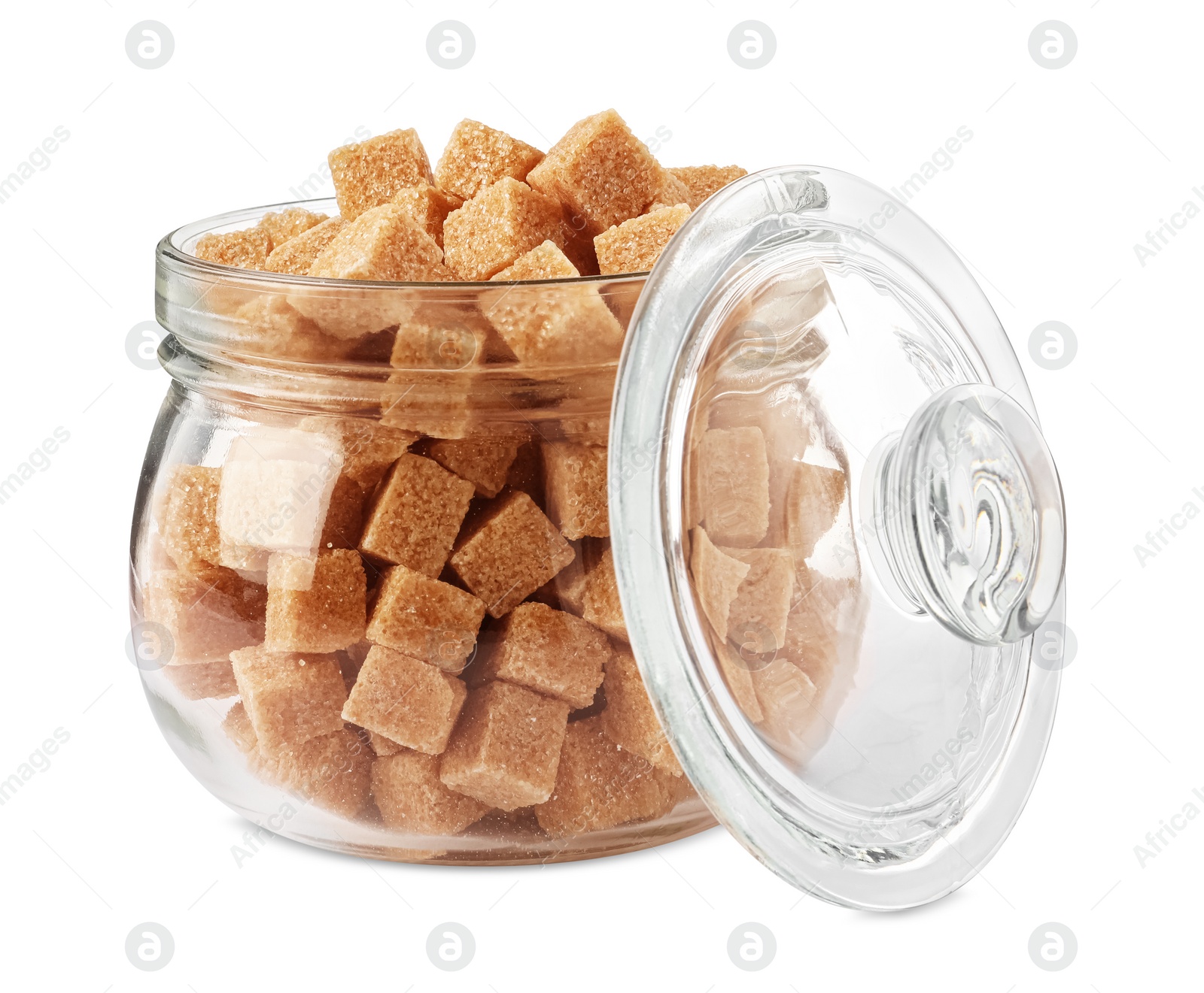 Photo of Glass jar of brown sugar cubes isolated on white