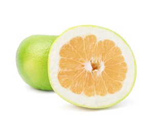 Photo of Whole and cut sweetie fruits on white background