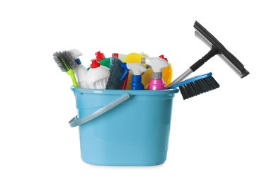 Plastic bucket with different cleaning supplies on white background