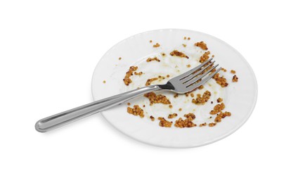 Dirty plate and fork on white background