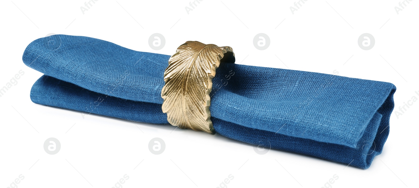 Photo of Blue fabric napkin with decorative ring for table setting on white background