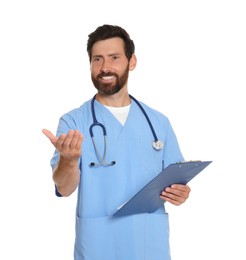 Photo of Happy doctor with stethoscope and clipboard on white background