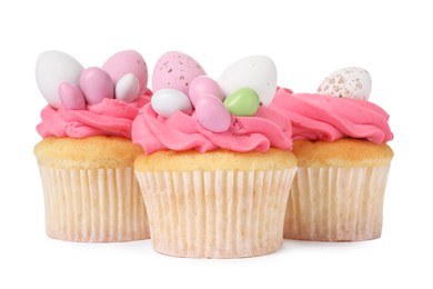 Photo of Tasty decorated Easter cupcakes isolated on white