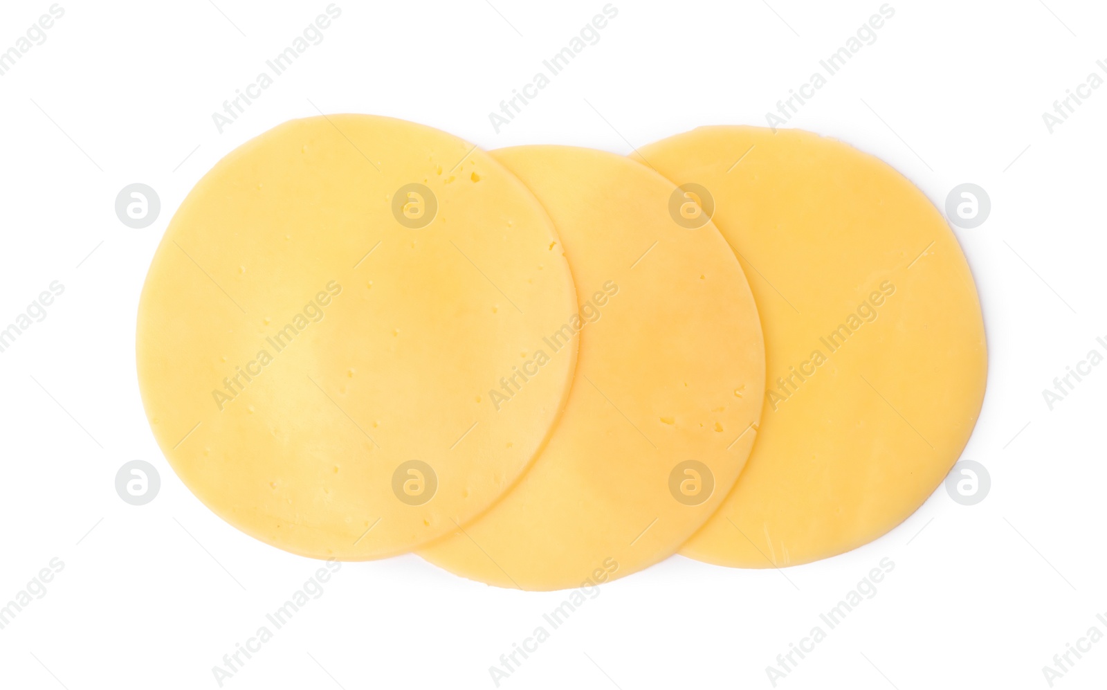 Photo of Slices of tasty fresh cheese isolated on white, top view