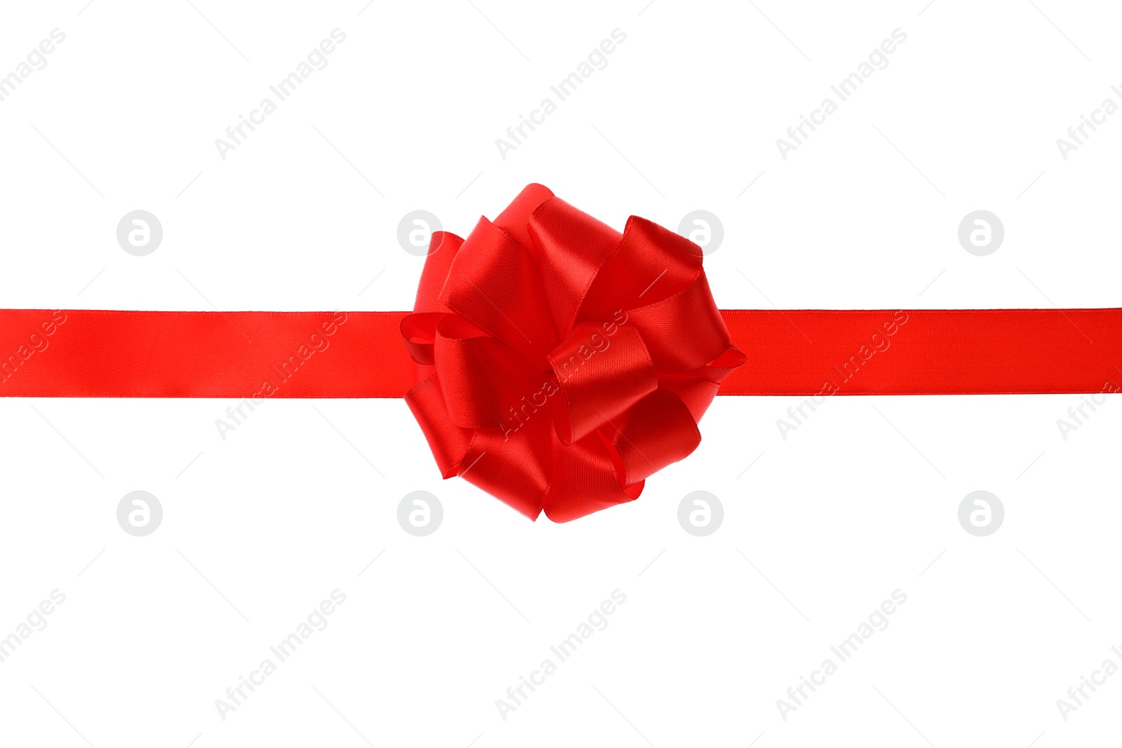 Photo of Red ribbon with bow on white background. Festive decoration