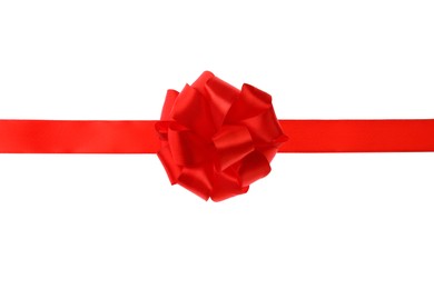 Photo of Red ribbon with bow on white background. Festive decoration