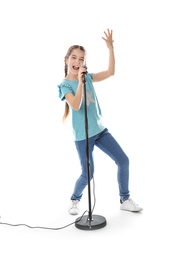 Cute girl singing in microphone on white background