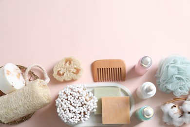 Photo of Bath accessories. Flat lay composition with personal care products on pink background, space for text