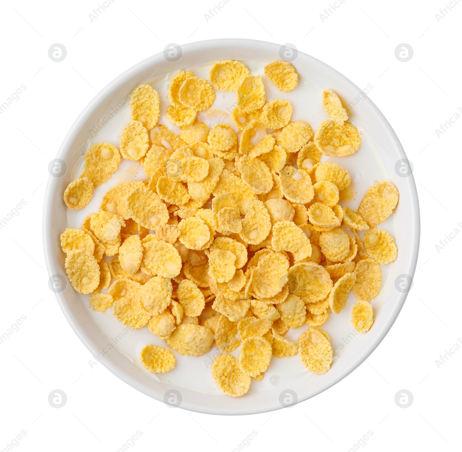 Photo of Breakfast cereal. Corn flakes and milk in bowl isolated on white, top view