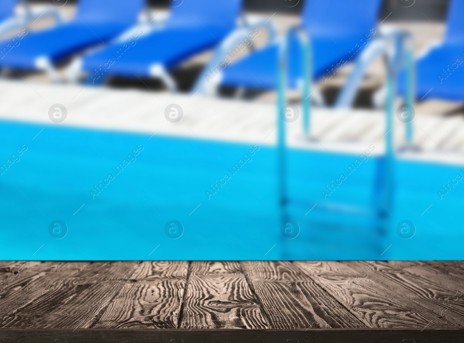 Image of Wooden deck near swimming pool outdoors on sunny day. Space for text