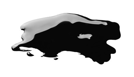 Photo of Black glossy oil blob isolated on white, top view