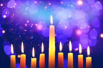 Hanukkah celebration. Burning candles against dark blue background with blurred lights, closeup