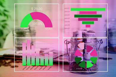 Forex trading. Glass jar with money on table and charts
