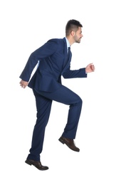 Photo of Businessman walking on white background. Career ladder