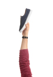 Photo of Man holding stylish shoe on white background, closeup