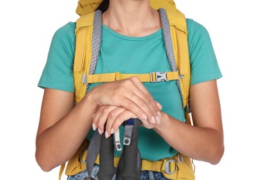 Photo of Woman with backpack and trekking poles on white background, closeup