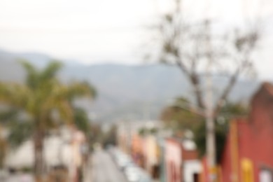 San Pedro Garza Garcia, Mexico – February 8, 2023: Blurred view of street with cars and beautiful buildings