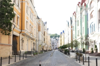 Blurred view of buildings with beautiful windows in city