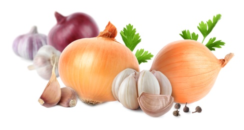 Mix of fresh garlic and onions on white background. Banner design