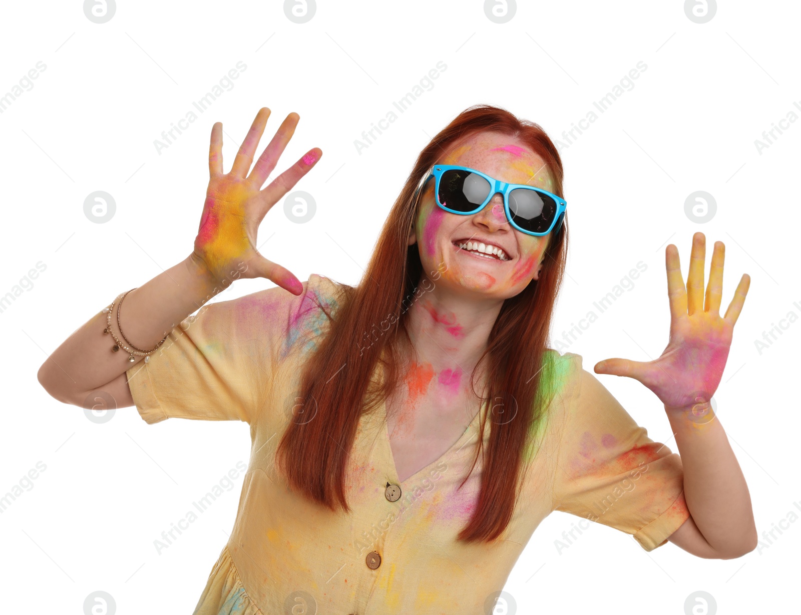 Photo of Woman covered with colorful powder dyes on white background. Holi festival celebration