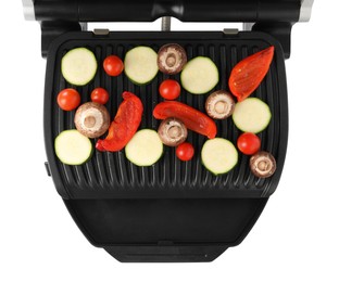 Photo of Electric grill with tomatoes, zucchini, bell pepper and mushrooms isolated on white, top view