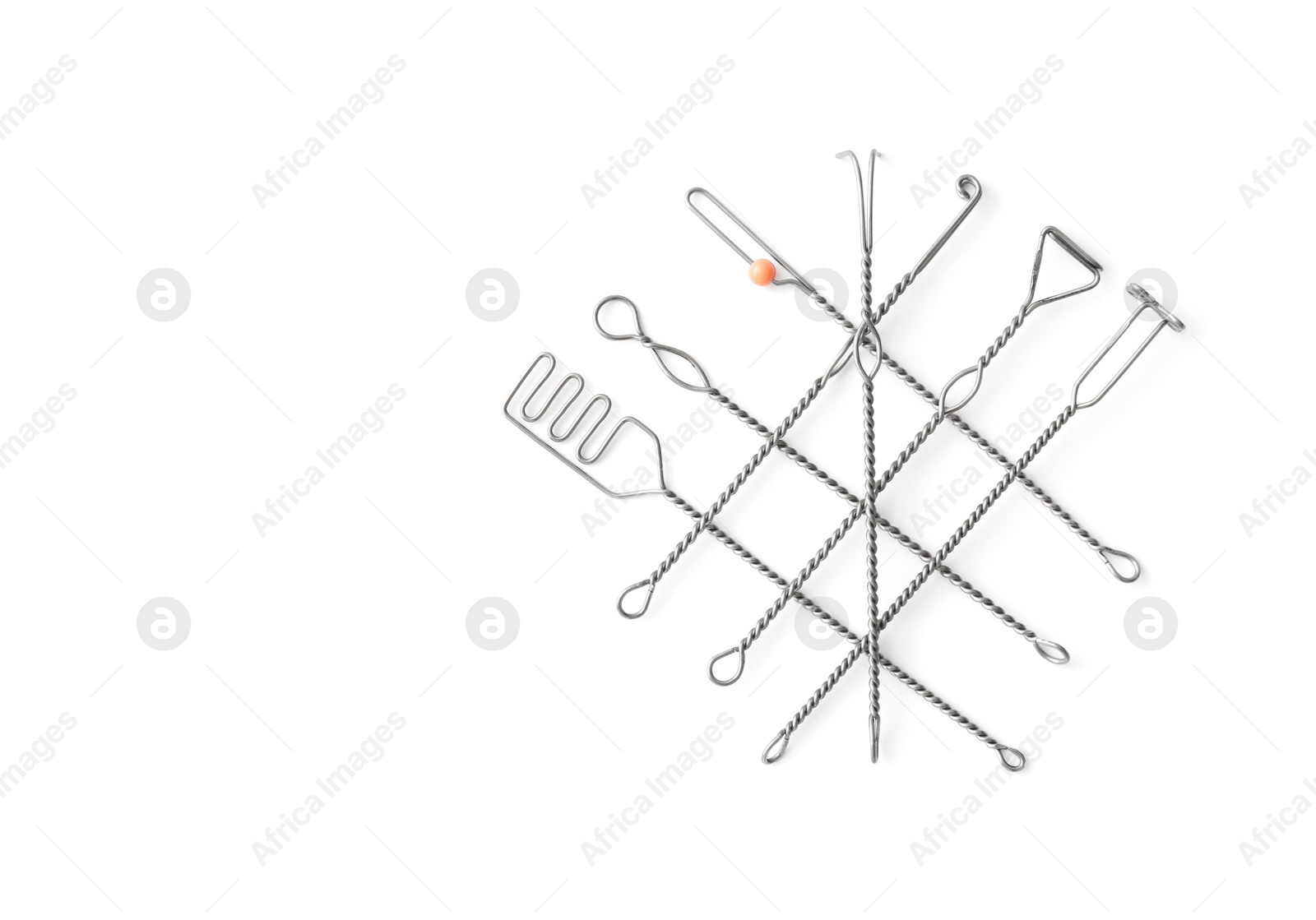 Photo of Set of logopedic probes on white background, top view. Speech therapist's tools