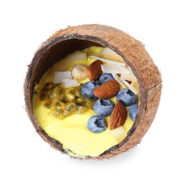 Tasty smoothie bowl with fresh blueberries and almonds in coconut shell isolated on white, above view