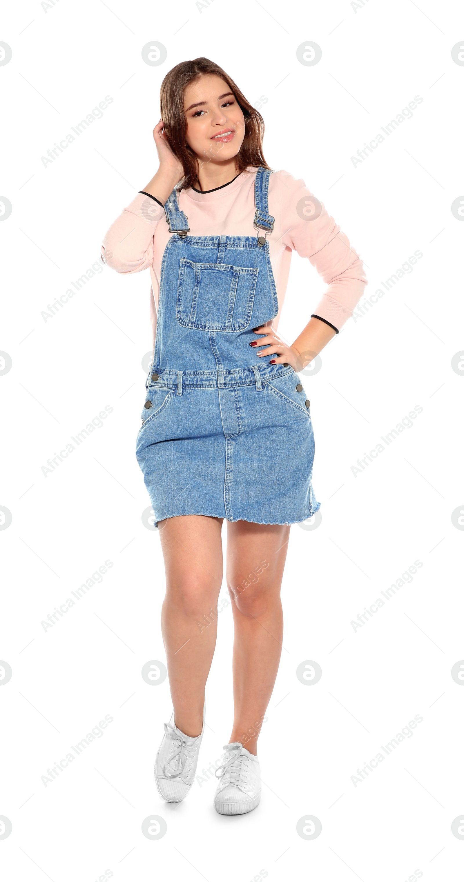 Photo of Beautiful teenage girl in stylish clothes on white background