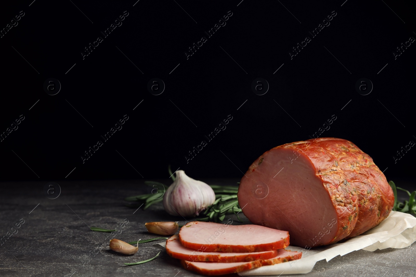 Photo of Delicious ham on grey table, space for text. Christmas dinner