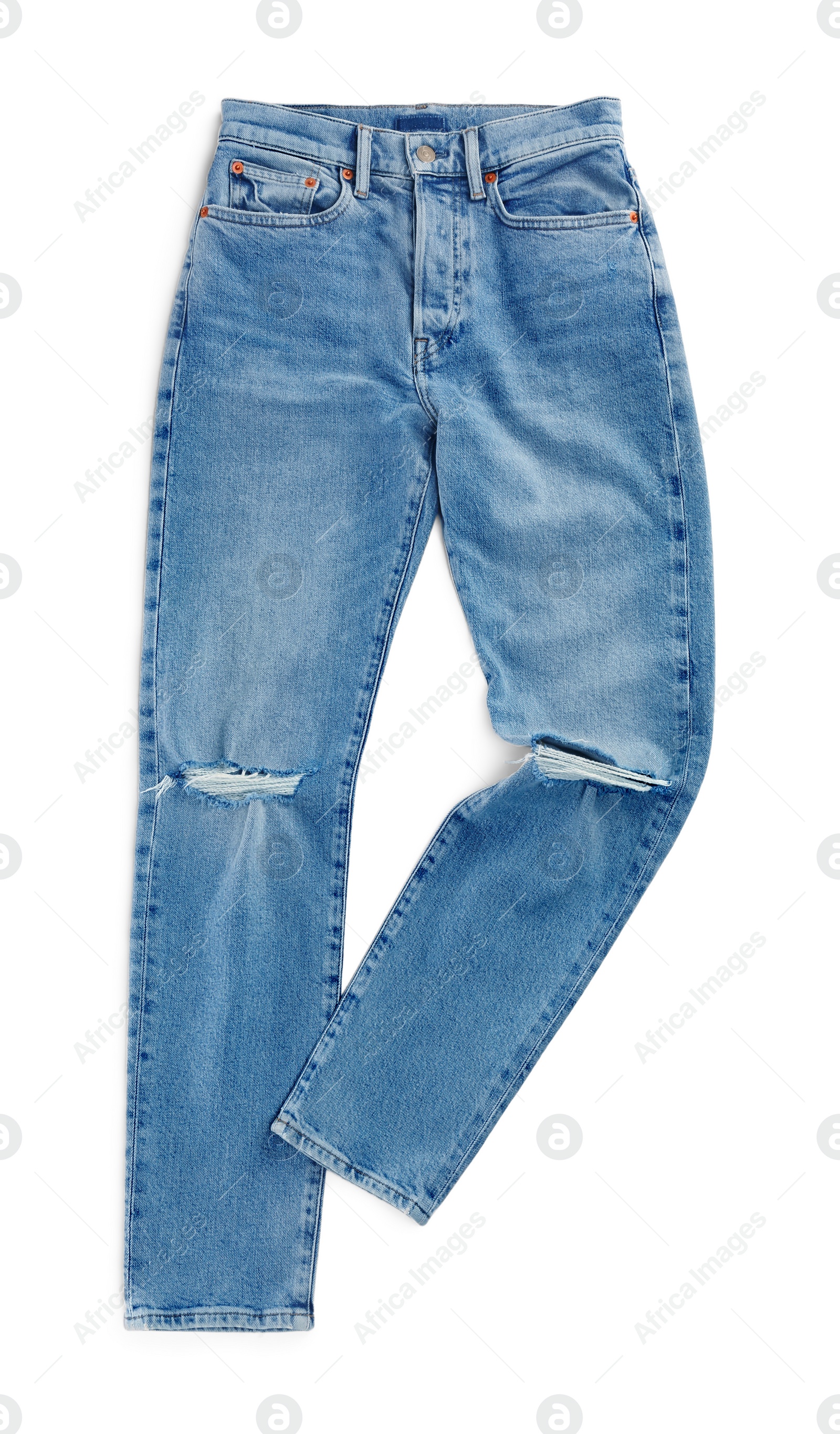 Photo of Light blue jeans isolated on white, top view. Stylish clothes