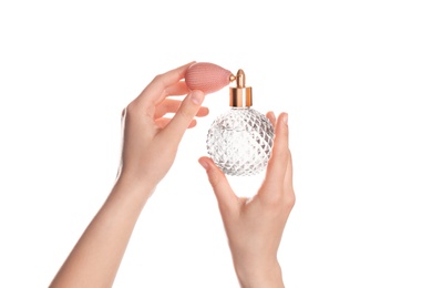 Photo of Woman with bottle of perfume isolated on white, closeup