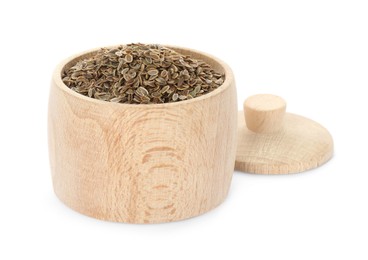 Photo of Wooden jar of dry dill seeds isolated on white