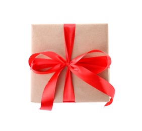 Christmas gift box decorated with ribbon bow on white background, top view