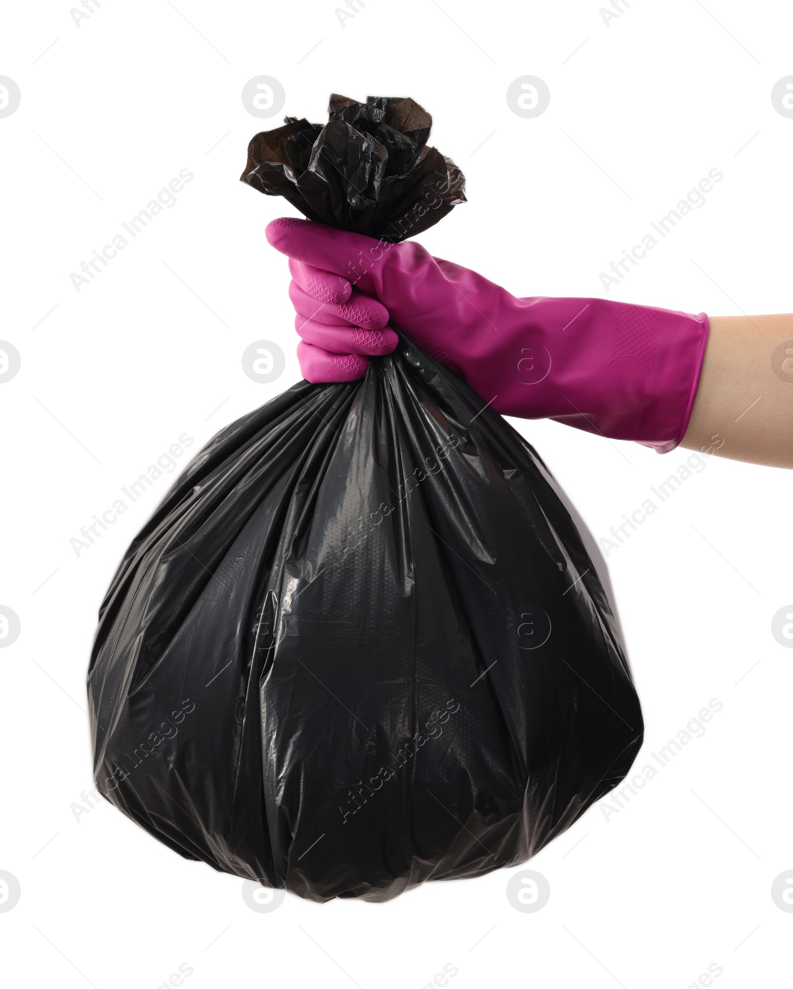 Photo of Woman holding plastic bag full of garbage on white background, closeup