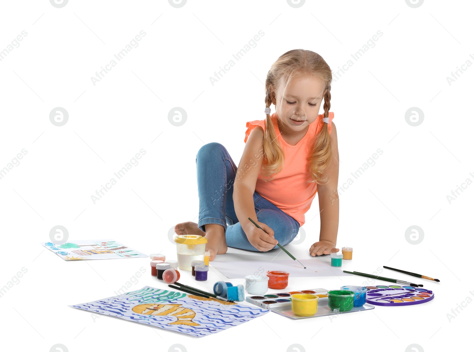 Photo of Cute child painting picture on white background