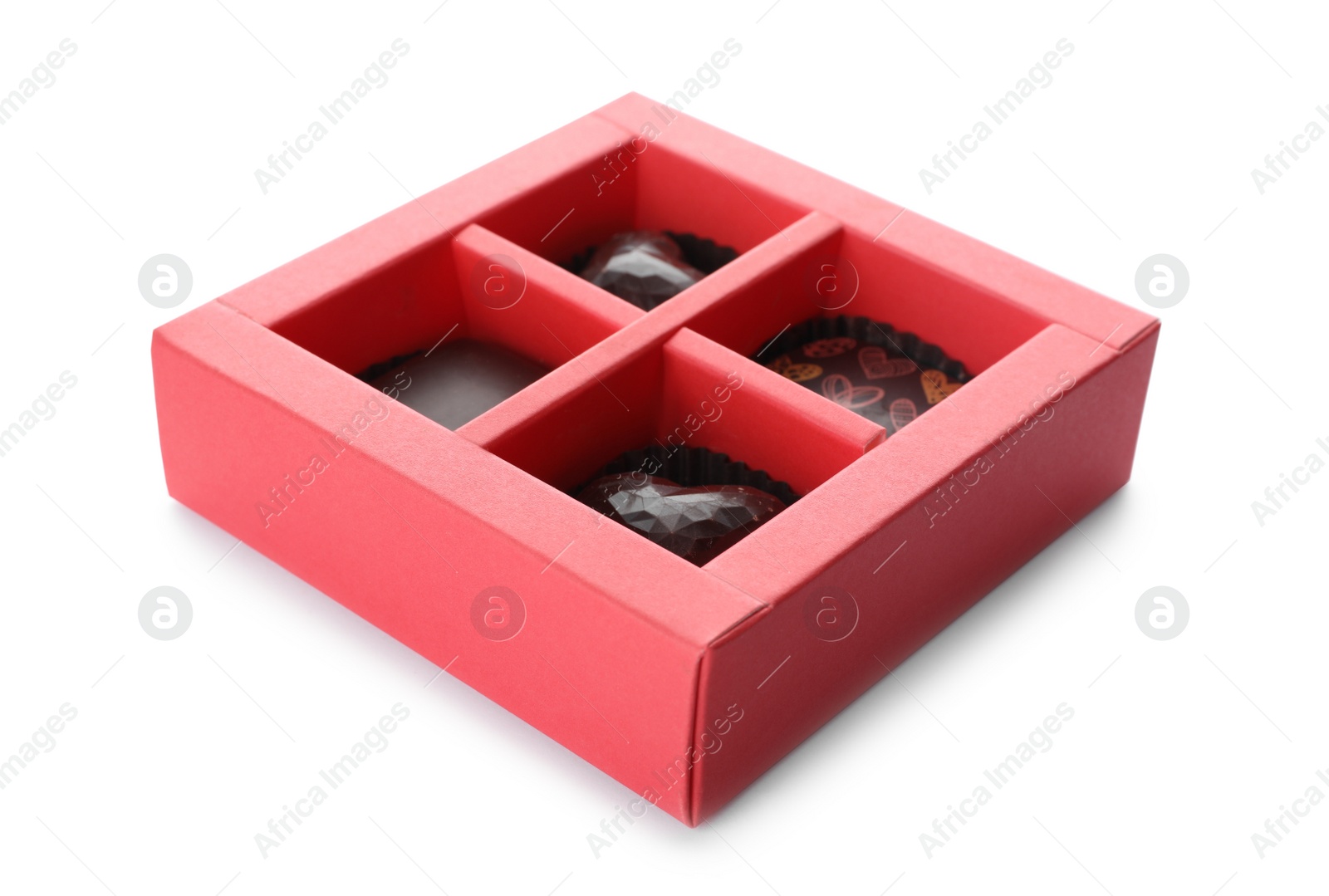Photo of Box with tasty chocolate candies isolated on white