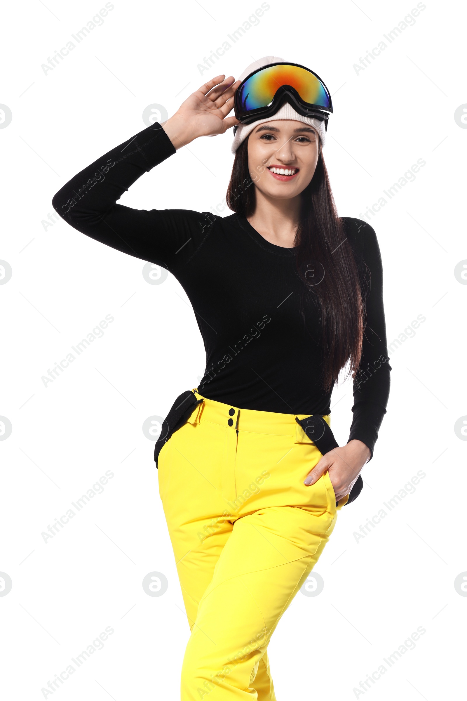 Photo of Woman wearing stylish winter sport clothes on white background