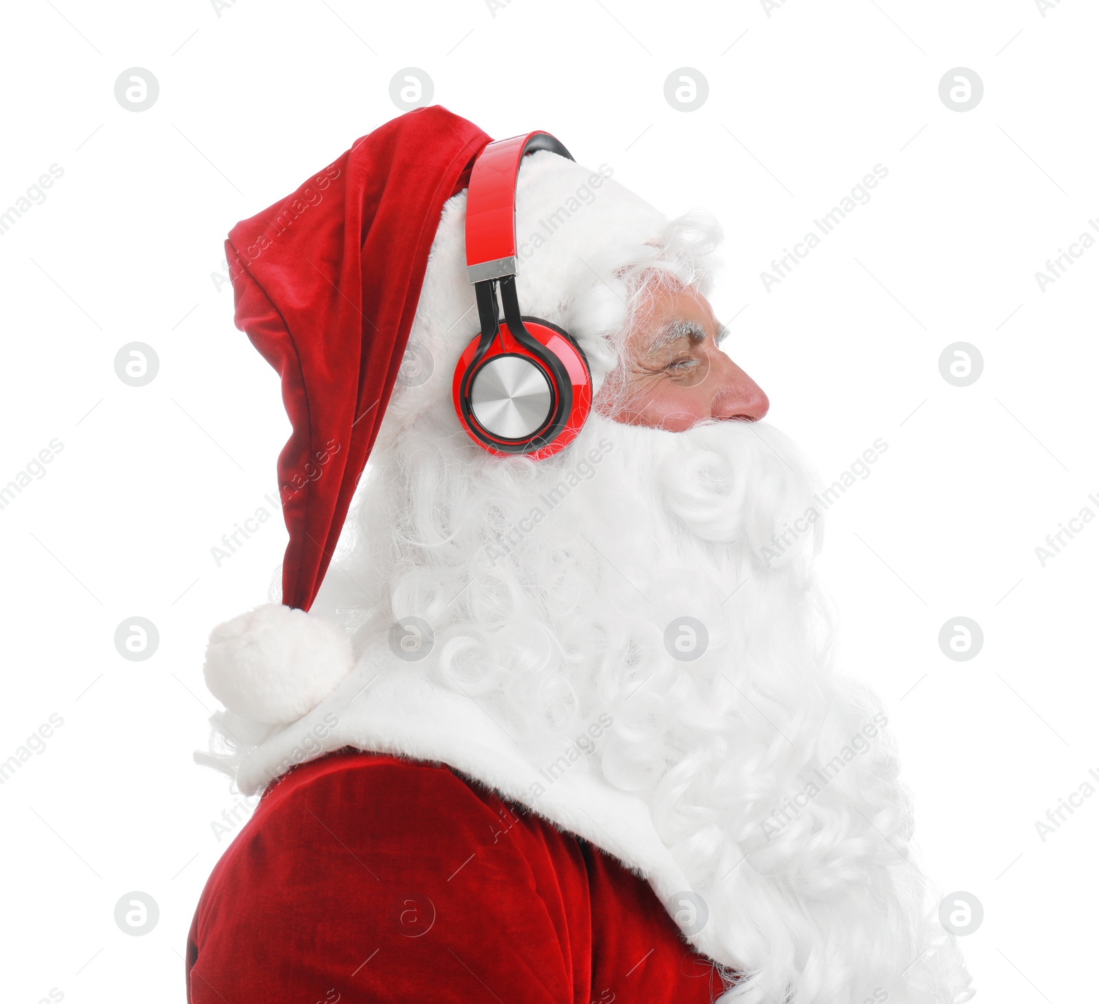 Photo of Santa Claus listening to Christmas music on white background