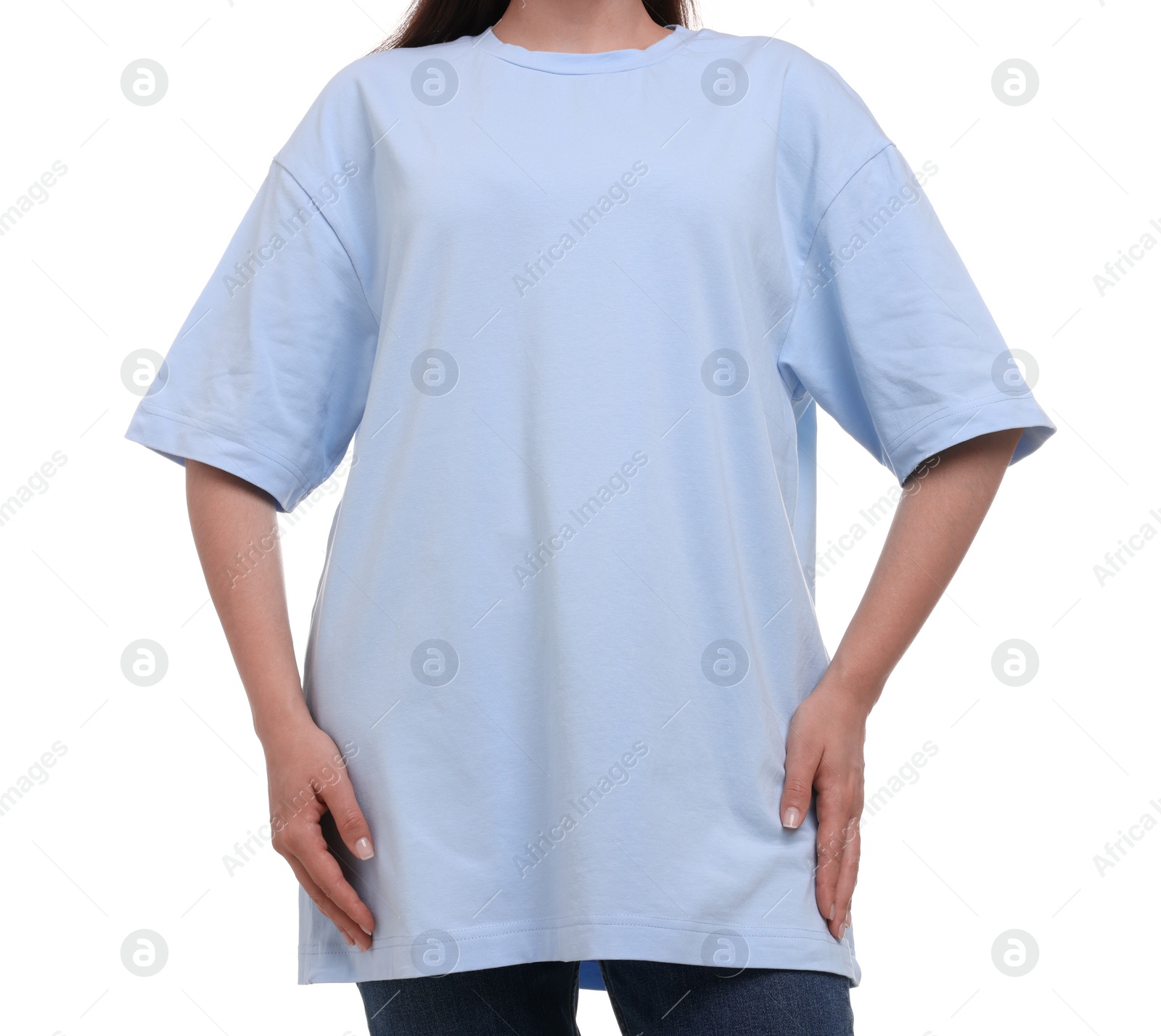 Photo of Woman in stylish light blue t-shirt on white background, closeup